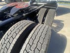 Passenger side rear frame and tire tread for this 2026 Mack Pioneer HB64T (Stock number: TM100262)