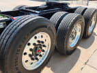 Driver side rear frame and tire tread for this 2026 Kenworth W900L (Stock number: TR216633)