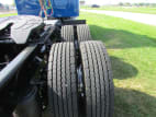Passenger side rear frame and tire tread for this 2026 Kenworth W900L (Stock number: TR218306)