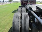 Driver side rear frame and tire tread for this 2026 Kenworth W900L (Stock number: TR218307)