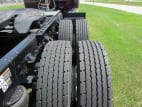 Passenger side rear frame and tire tread for this 2026 Kenworth W900L (Stock number: TR218307)