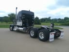 Exterior rear driver side for this 2026 Kenworth W900L (Stock number: TR218362)