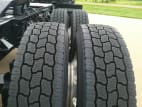 Passenger side rear frame and tire tread for this 2026 Kenworth W900L (Stock number: TR218362)
