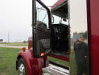 Drivers side door open for this 2026 Kenworth W900L (Stock number: TR224556)