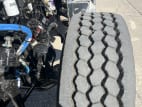 Driver side front tire tread for this 2026 Kenworth W900L (Stock number: TR224699)