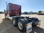 Exterior rear driver side for this 2020 Kenworth W990 (Stock number: ULJ390612)
