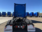 Exterior full rear view for this 2021 Kenworth T680 (Stock number: UMJ432106A)