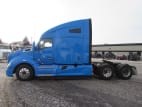 Exterior full driver side for this 2021 Kenworth T680 (Stock number: UMJ434771A)