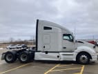 Exterior full passenger side for this 2021 Kenworth T680 (Stock number: UMJ434852)