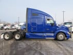 Exterior full passenger side for this 2021 Kenworth T680 (Stock number: UMJ434869A)