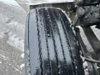 Driver side front tire tread for this 2021 Kenworth W900L (Stock number: UMR426555)