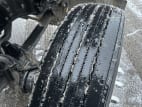 Passenger side front tire tread for this 2021 Kenworth W900L (Stock number: UMR426555)