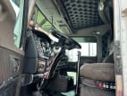 Drivers side door open for this 2021 Kenworth W900L (Stock number: UMR431043)