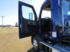 Drivers side door open for this 2021 Freightliner Cascadia (Stock number: UMSMY7393)