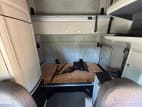 Interior wide sleeper view for this 2022 Peterbilt 579 (Stock number: UND759971)