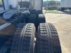 Passenger side rear frame and tire tread for this 2022 Peterbilt 579 (Stock number: UND759971)