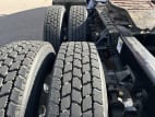 Driver side rear frame and tire tread for this 2022 Kenworth T680 (Stock number: UNJ466600)