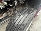 Driver side front tire tread for this 2022 Kenworth T680 (Stock number: UNJ466604)