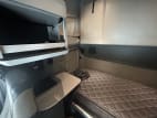 Interior passenger side sleeper for this 2022 Kenworth T680 (Stock number: UNJ466604)