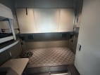 Interior wide sleeper view for this 2022 Kenworth T680 (Stock number: UNJ466604)