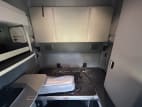 Interior wide sleeper view for this 2022 Kenworth T680 (Stock number: UNJ466622)