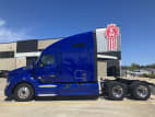 Exterior full driver side for this 2022 Kenworth T680 (Stock number: UNJ467040)