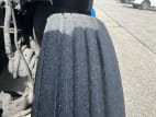 Driver side front tire tread for this 2022 Kenworth T680 (Stock number: UNJ467053)