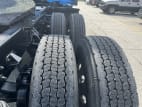 Passenger side rear frame and tire tread for this 2022 Kenworth T680 (Stock number: UNJ467053)