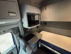 Interior passenger side sleeper for this 2022 Kenworth T680 (Stock number: UNJ467088)