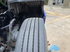Passenger side front tire tread for this 2022 Kenworth T680 (Stock number: UNJ467088)