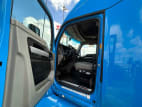 Drivers side door open for this 2022 Kenworth T680 (Stock number: UNJ467114)