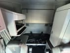 Interior wide sleeper view for this 2022 Kenworth T680 (Stock number: UNJ467114)