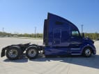 Exterior full passenger side for this 2022 Kenworth T680 (Stock number: UNJ467145)