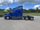 Exterior full driver side for this 2022 Kenworth T680 (Stock number: UNJ469331)