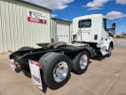 Exterior rear passenger side for this 2022 Kenworth T880 (Stock number: UNJ471037)