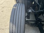 Passenger side front tire tread for this 2022 Kenworth T680 (Stock number: UNJ477963)