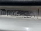 VIN tag for this 2022 Kenworth T680 (Stock number: UNJ477967)