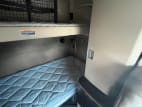 Interior driver side sleeper for this 2022 Kenworth T680 (Stock number: UNJ479147)