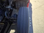 Driver side front tire tread for this 2022 Kenworth T680 (Stock number: UNJ494054)