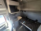 Interior passenger side sleeper for this 2022 Kenworth T680 (Stock number: UNJ494054)