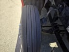 Passenger side front tire tread for this 2022 Kenworth T680 (Stock number: UNJ494054)
