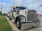 Exterior front passenger side for this 2023 Kenworth W990 (Stock number: UPJ220957)