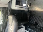 Interior passenger side sleeper for this 2023 Kenworth W990 (Stock number: UPJ220957)