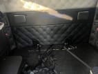 Interior wide sleeper view for this 2023 Kenworth W990 (Stock number: UPJ220957)
