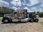 Exterior full driver side for this 2023 Kenworth W990 (Stock number: UPJ220959)
