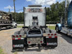 Exterior full rear view for this 2023 Kenworth W990 (Stock number: UPJ220959)
