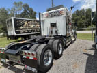 Exterior rear passenger side for this 2023 Kenworth W990 (Stock number: UPJ220959)
