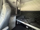 Interior passenger side sleeper for this 2023 Kenworth W990 (Stock number: UPJ220959)
