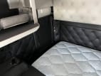 Interior passenger side sleeper for this 2023 Kenworth W990 (Stock number: UPJ220961)
