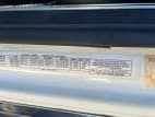 VIN tag for this 2023 Kenworth W990 (Stock number: UPJ220964)